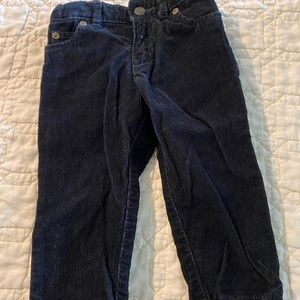 Carter’s black corduroys.